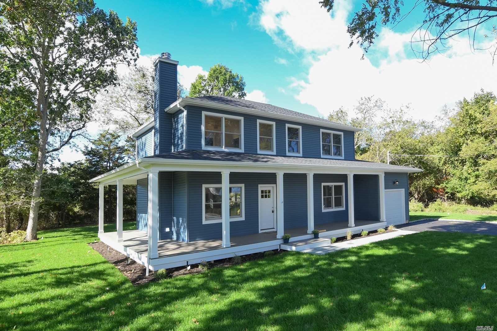 Beautifully constructed Brand new home in picture perfect area. Waterviews from your wrap- around porch. Two close pathways to beaches with superior views of Shelter Island. Room for pool too!! The Seaside Village of Greenport is a short distance away! Check back for professional photos.