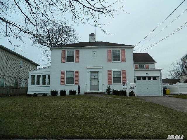 Nassau Shores Waterfront Colonial With New Bulkhead. Elevation Certificate And Flood Insurance Quote Attached. New Heating System.