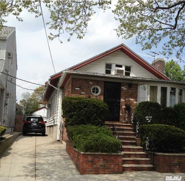 Detached Brick And Frame Expanded Ranch W/ 2nd Fl. Great Mother/Daughter Set Up. Very Good Condition W/ Hardwood Floors,  L/R W/Fireplace,  Den On 1st Fl,  Finished Basement W/Wet Bar,  Detached Garage W/Private Driveway That Holds Several Cars,  3 Blocks To Lirr (Broadway),  3 Blocks To Ps 32,  Brand New Gas Furnace And Hot Water Heater