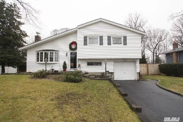 Recently Renovated,  Open And Bright First Level. Living Room With Vaulted Ceiling And Fireplace,  Formal Dining Room,  Eik,  With Center Island,  Wood Cabinets,  Ss Appliances And Stone Counters. Beautifully Redone Baths,  Hardwood Flrs, ,  Updtd Windows&Roof,  Gascooking,  Fin. Basement,  Attached Garage Perfect Mid Block Location And Huge Rear Yard,  Igs. Just Bring Your Toothbrush!