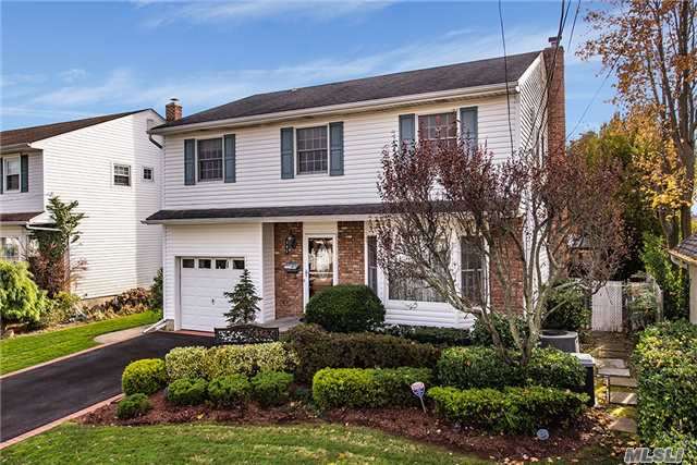 Beautiful Massapequa Shores Colonial Featuring: A Great Open Floor Plan, Formal Living Room*Formal Dining Rm*Updated Eik W/New S/S Appliances* Fam. Rm W/Gas Fplce*Cathedral Ceilings/Skylights*Hw Floors*Finished Bsmt*Gas Heat*Cac* Htd Saltwater Ig Pool W/New Liner*Paver Patio*Whole House Generator*Igs*Garage W/Garage Tek System*& X Zone For Flood Insurance. Wow!