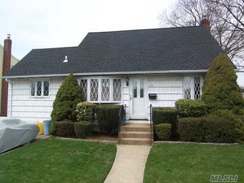 Spacious, Move In Ready! 5Br 3Bth Rear Dormered Cape With Updated Windows, Cac, 2 New Baths, Updated Electric,New Gas Heating System, Igs,New Roof, Hardwood Floors. Possible M/D With Proper Permits, Handicap Accessable. Charles Campaign Elementary.