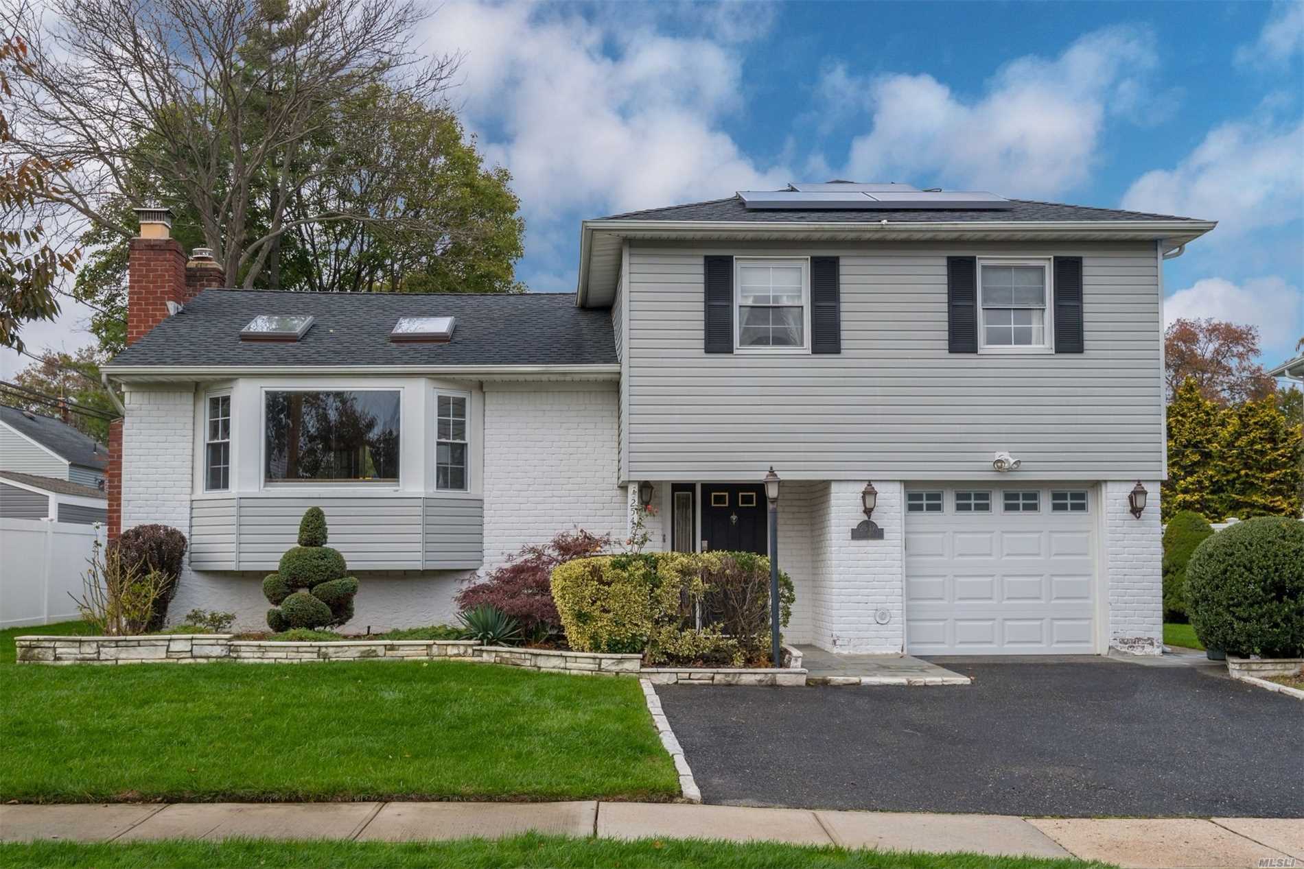 Beautiful, Updated/Exp Split -Perfect Move In Rdy Home W/3Skylights, Energy Eff: Solar Panels, Dishwasher, Mobile Controlled Thermos& Updated Windos & Roof. Eik W/Ss Appliances, Bfast Bar, Vented Hood For Cooking, Induction Stove Top, Microwave/Convection Oven. Part Fin Bsmnt, Exp. Fmly Rm& Open Concept Den/Dr. Vaulted Ceilings, Slider To Outdoor Deck/Patio In Large Yard.
