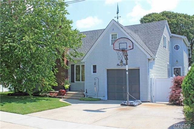 Expanded Cape Much Larger Than Expected! Home Features 6 True Bedrooms, Hardwood Floors, 4 Full Bathrooms. Formal Living Room, Formal Dining Room And Large Eat In Kitchen.  Great Room With French Doors Leading To Timber Tech Deck In Resort Like Backyard With Koi Pond. Located On Quiet Dead End Street. This One Is A Must See!