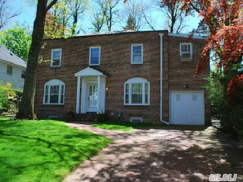 Gorgeous Brick Colonial In The Prestigious Village Of Great Neck Plaza.Located In The Wyngate Area.This Wonderful Home Offers: 3/4 Br's,2 New Full & 1 Half Bth.Special Features Include: Some New Windows,New Bths,Gas Hw Heat,Sprinkler & Alarm Sys,Newly Fin Bsmt,New Front Loading Washer/Dryer,Lovely Backyard W/Deck.Steps To Lirr & Town.Saddle Rock & South Schools.Park Dist.