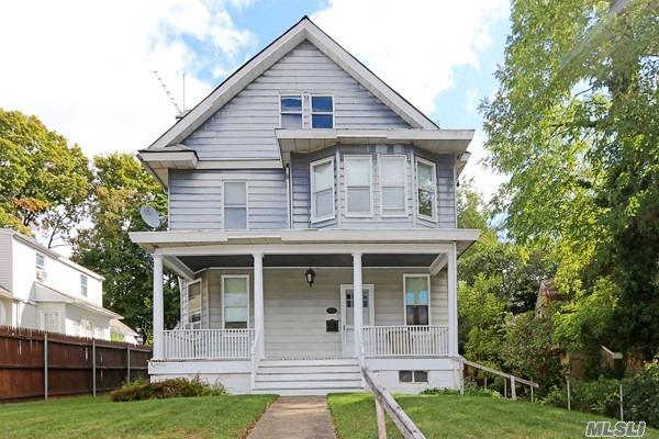 Classic, Turn of the Century, Mid-block Colonial. Original wood work in tact, original fireplace in LR, Tall, high ceilings on both first and second floor. Full, Walk-Up staircase to attic. 2 Car- Detached Garage.