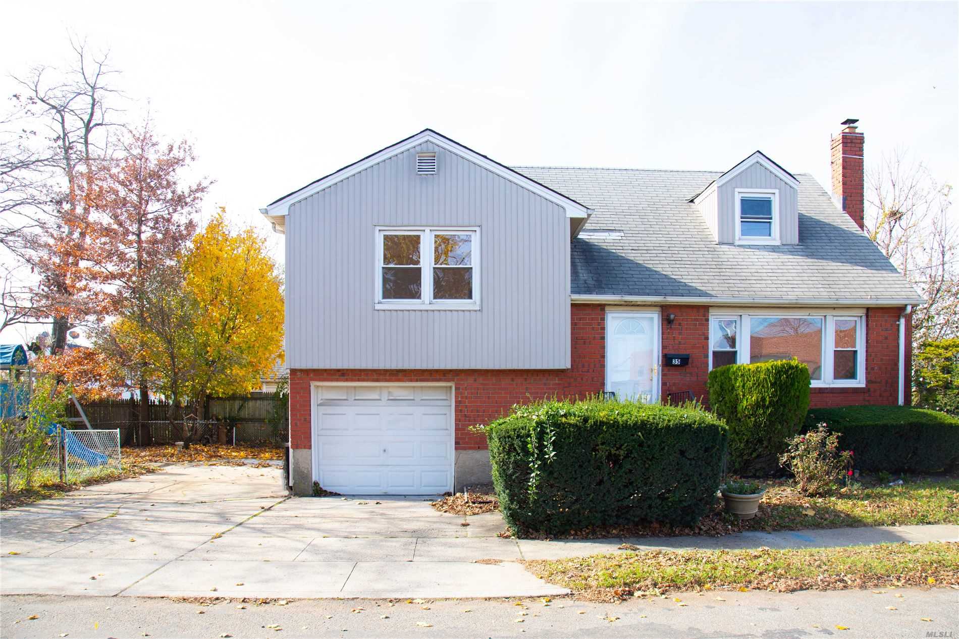 Welcome To This Move-in Ready Charming Split. Almost New, Totally Renovated, Bright, Spacious, Open Floor Plan, Attached garage, Lot Of Storage. Convenient location, Close to transportation and shopping!! Close to LIRR. Come See It Today Before It's Gone!!