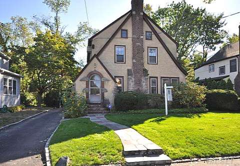 First Showing Beautiful Stucco Tudor In Perfect Mid-Block Location. Featuring A Traditional Foyer With Coiffered Ceilings Leading Into An Oversized Living Room W/ Hardwood Floors And Woodburning Fireplace. Arched Opening Leads Into A Beautiful Formal Dining Room. Sun Filled Separate Family Room. 3 Bedrms 1.5 Bath Walk Up Attic. Full Fin Bsmnt With High Ceilings, Det 2 Car 