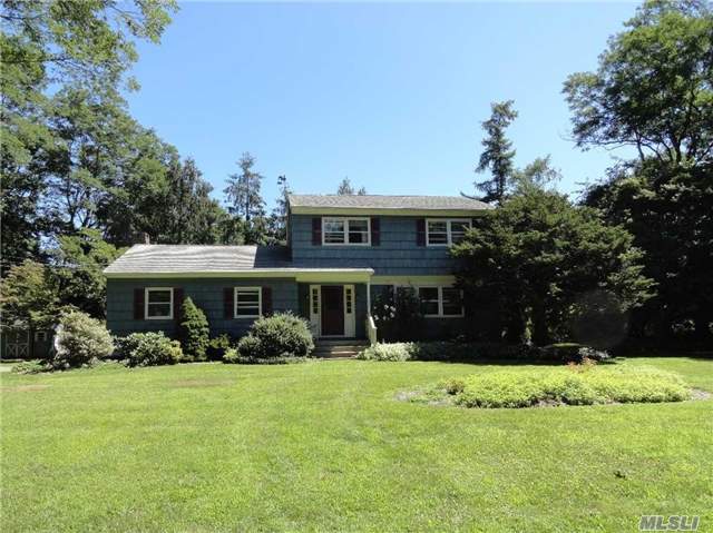 Spacious Cutchogue Colonial Located On A Quiet Tree Lined Street With A Large Yard And Pretty Setting. Oversized Eat In Kitchen, Formal Dining Room, Den With Fireplace And Wood Floors. This Sunny, Bright Home Has Endless Possibilities.