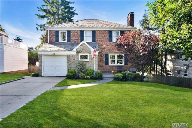 A True Manhasset Gem. This Home Is Nestled On A Quiet And Serene Lane, Yet Is Convenient To The Schools, Town, The Lirr And All That Manhasset Has To Offer. This Classic Brick Center Entrance Colonial With A Slate Roof, Offers 3 Bedrooms And 2.5 Baths With Both A Formal Living Room And Dining Room