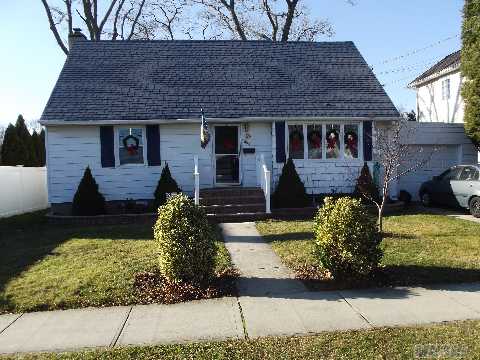 Wide Line Cape-4 Bedrooms-2 Full Baths-10X15 Family Room Rear Extension-Large Updated Kitchen-Formal Dining Room-Living Room-2 New Full Baths-Beautifully Finished Floors In Lr And Dr-Full Basement-New 30 Yr Arch Roof-Updated Peerless Furnace-Deck Off Family Room-Sd#23