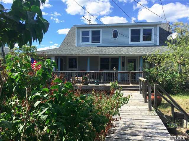 Sparkling Water Views From Spacious Master Bedroom Suite. Fully Renovated With Rare Stone Countertops And Sinks Lr/Dr Leads To Decks And More Water Views. High Ceilings And Glossy Hardwood Floors. Located On A Very Beachy Boardwalk. Feel Like You&rsquo;re On Vacation Everyday.