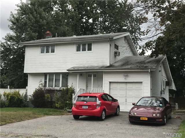 3 Bedroom Colonial, 1.5 Bath & Full Basement. Home Needs Tlc