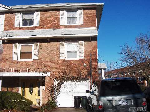 **Exclusive** South/East Exposure! Largest 2 Family Split!! Highly Desirable & Spacious Duplex Over Tiplex On Oversized Lot.  Parking For 4 Cars.  7 Bedrooms In Total, Master Bedroom Suites, Renovated Kitchens, Short Distance To Schools: P.S. 203 Cardozo H.S., Queensborough College, Near Q27, 31 Buses, Shopping And All Major Highways.