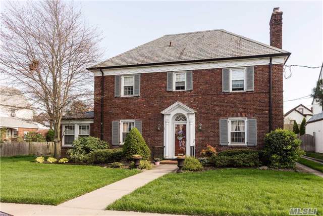 Federal Style Center Hall Colonial On Dead-End Block In Desirable Rvc Village. Elegant Living Rm W/Wood Burning Fpl & Formal Dining Rm Featuring Exquisite Crown Moldings, Oak Wood Flrs W/Walnut Inlay Thru-Out. Eik, Full Bath, Br/Den & Sun Rm Round Out The 1st Flr. 2nd Flr Offers Full Bath, Two Large Br & Master Bedroom W/Full Bath. Roof Deck Above Open Rear Porch.