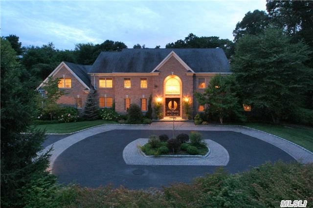 Classic Brick Colonial Nestled On 2 Lush Acres. Grand Two-Story Entry, Sweeping Staircase, Formal Dining And Living Rooms, Custom Millword, Butlers Pantry, Cherrywood Library, Den W/ Fp, Granite Center Island Kit W/Breakfast Rm, Master Suite W/Sitting Rm, Balcony, & Walk-In Closets, Large Fam Bedrooms Plus Bonus Rm, Fin Bsmt W/Full Bth, & Bed, Ig Heated Pool, Estate Fencing, Patios