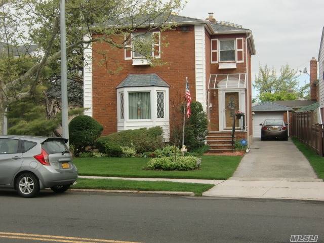 Fully Updated Brick Colonial In Mint Condition With Legal Extension. Walking Distance To Bay Terrace Mall. Southern Exposure. New Large Kitchen With Granite Countertops, New Appliances And A Skylight. Formal Dining Room And Large Sunken Living Room. Second Floors Has 3 Large Bedrooms And Jacuzzi Bath. Master Br With Full Bath. Plenty Of Large Closets. A Must See.