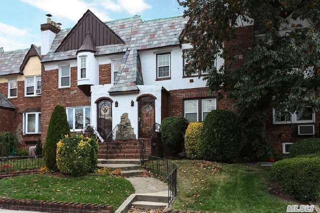 Charming Tudor Conveniently Block Away From Gibson Lirr Station! Updated: Upstairs Full Bath W/ Bath Tub,  Separate Glass Shower Stall,  Elegant Stained-Glass Window,  & Main Level 1/2 Bath. Wood Burning Fireplace In Large Lr,  Open To Fdr W/ Sliders To Rear Wood Deck Make For Great Entertaining. Space For 2 Cars In Driveway In Addition To 1 Car Garage! Basic Star $1669