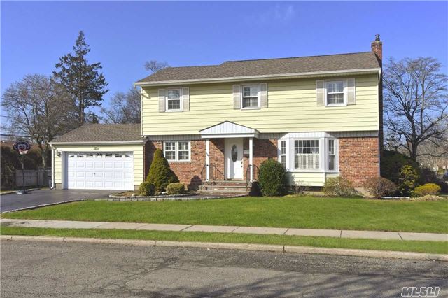 Solid Centerhall Colonial Featuring 4 Bedrooms, 2.5 Baths, Clean Eat-In Kitchen, Formal Dining Room, Full Finished Basement & Den. Hardwood Floors Throughout, Cac, Gas Cooking/Heat, 4 Zones. 2 Car Garage W/ Entry Through Den. In Ground Sprinklers, Large Back & Side Yards. Syosset Schools, Ap Willets Elementary And Hb Thompson Within Few Blocks. Taxes Have Been Grieved.