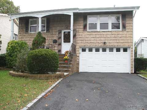 Fabulous Open Floor Plan.  4Br, 3Bath(2New 1W/Steam Shower), Hi-Ranch In Soundview.  Totally Renovated New, Beautiful, Gourmet, Granite/Cherrywood Kitchen With Stainless Steel Appliances.  New Cac, New Windows And Doors, Hard-Wood Floors And Garage Door. Generous Areas For Entertaining With Both Deck And Bluestone Patio. Large Private Yard And 2 Car Garage.