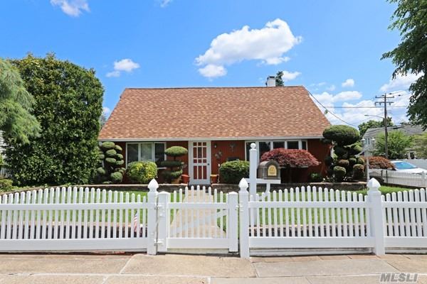 Please Do Not Judge This House From the Front! Much Larger Than it Looks! Full Rear Dormer-Main Level Ext Across Entire Rear of the House-Large Oversized Extended Like New Eik w 3 Skylites-Custom Crown Moldings-8 Ft Sliders to Delightful Lovingly Maintained Yard w Custom Playhouse-Fully Fenced-ML Kmbdrm w Pass thru to Des Bth w Jac Tub-Front LR and Add Bdrm-Upstairs 2 Large Rms-2 Fbths-Poss M/D Permit Req-New Top of Line-Energy Eff Boiler 5 Zone-200 Amp Elec-New 30 Yr Arch Roof-Convenient to All