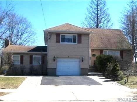 Updated Split Level Home Located In Massapequa Shores *  Oversized Parklike Property * New Boiler * Den With Fireplace * Updated Kitchen With Granite Floors, Stainless Steel Appliances * Close To Shopping And Transportation.* Star Savings Of $1255