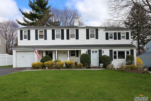 Oversized & Expanded Colonial In Prestigious Roslyn Heights In Herricks School District. This Beautiful 4 Br, 3 Bth On Tree Lined Street In Bowers Hill Has A Sun Drenched Great Room With Hardwood Flrs, Formal Dr, Lr W/Woodburning Fpl, Den, Eik, Finished Basement, Plus Stand Up Attic. Closets Galore & Huge Yard. Close To Highways, Lirr, Restaurants & Shopping