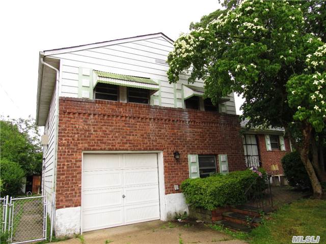 This Home Is Priced Right For The Person Looking To Add There Own Touch.. Sunken Living Room With Cathedral Ceilings And Fireplace. 3 Bedrooms 2 Full Baths On One Level. Den Area Has Flexible Layout With Full Bath And Outside Entrance. Large Yard. This One Won't Last.