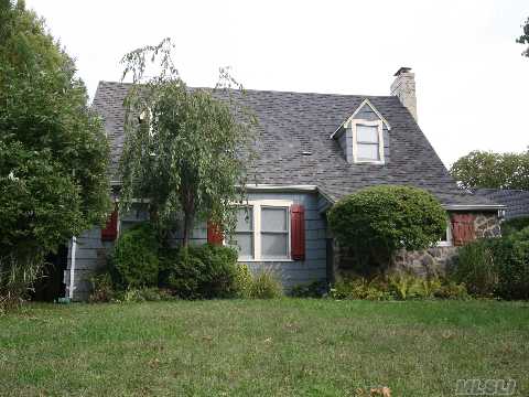 This Storybook Charmer Is Situated On A Quiet Dead End Street. True Entry Foyer Leads To A Warm And Inviting Beamed Ceiling Lr/Fpl & French Door To Patio And Yard. Fdr With Built In. Modern Eik, Bedroom And Full Bath Complete The First Floor. Second Floor Offers Two Spacious Br's And A Full Bath. Full Finished Basement With New Half Bath & Laundry Room. Walk To Town & Rr.