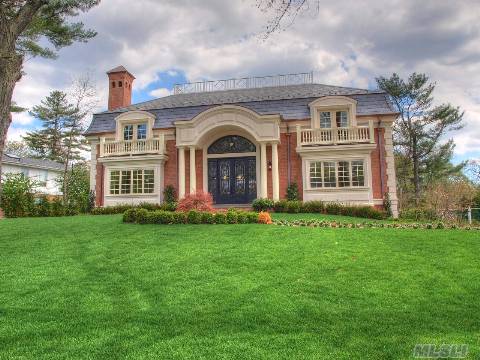 This Large And Impressive All Brick & Slate Roof Water Front Colonial Has Almost Too Many Stunning Details To Mention. Two Story Marble Foyer With Architectural Celing, Paneled Wood Formal Dinning Room With Fireplace. Extraordinary Granite Kitchen, Unbeleivable Formal Living Room. The Private Master Suite Exudes Luxury With Balcony And Onix Bathroom.