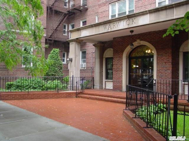 Pristine Prewar One Bedroom - Decorators Dream! Renovated Windowed Eik Featuring D/W And Microwave.  Renovated Windowed Bath.  Great Closet Space,  Plus Private Storage Available Immediately. Gorgeous Hardwood Floors,  Quiet Garden View,   Just Minutes To Shopping And Express Train.  15 Minutes To Midtown!