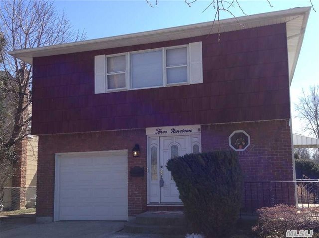 Village Hi-Ranch Near Lirr, Shopping, Hospital, Park, Pool, Features 4/5 Bed, 2.5Bths, Huge Basmt, Garage, 200Amp Elec, Gas Cooking & Heat,  2 Bedroom Apartment For Mom! ( Will Need Mother/Daughter Permit) Check Zoning, Desirable Park Section House Ready To Move Right In. Large Home.