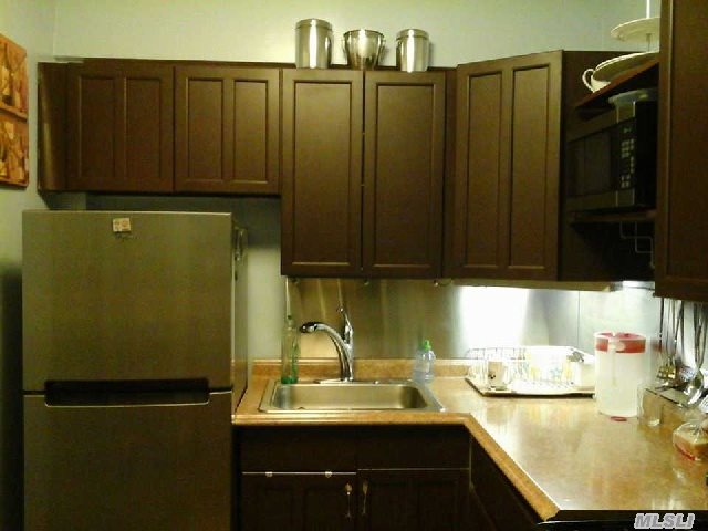 Large One Bedroom Boasting Hardwood Floors ~ Newly Renovated Kitchen ~ Lr/Dr Combo ~ Complex Offers Tennis Courts~  Basketball Court ~ Gym ~ Dusk To Dawn Private Security ~ Lobby Level Laundry Room ~ Bay Terrace Shopping Center Across The Street ~ Express Bus To Nyc Right Outside ~ Lirr About 1/4 Mile Away ~ This Is A Must See !!!