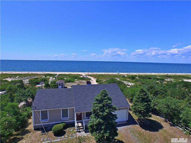 Spectacular Location On The Li Sound - Large Expanded Ranch In Sublime Setting Along The North Fork's Version Of Dune Road. 3 Bedroom, 2 Bath Beach House On Large, Private And Spacious Lot - Awaiting You... Walk Out Into The Sand And Enjoy Yourself - No Bluff Here!!! The Perfect Weekender In North Fork Wine Country By The Beach... Ez To Expand. Just Reduced!