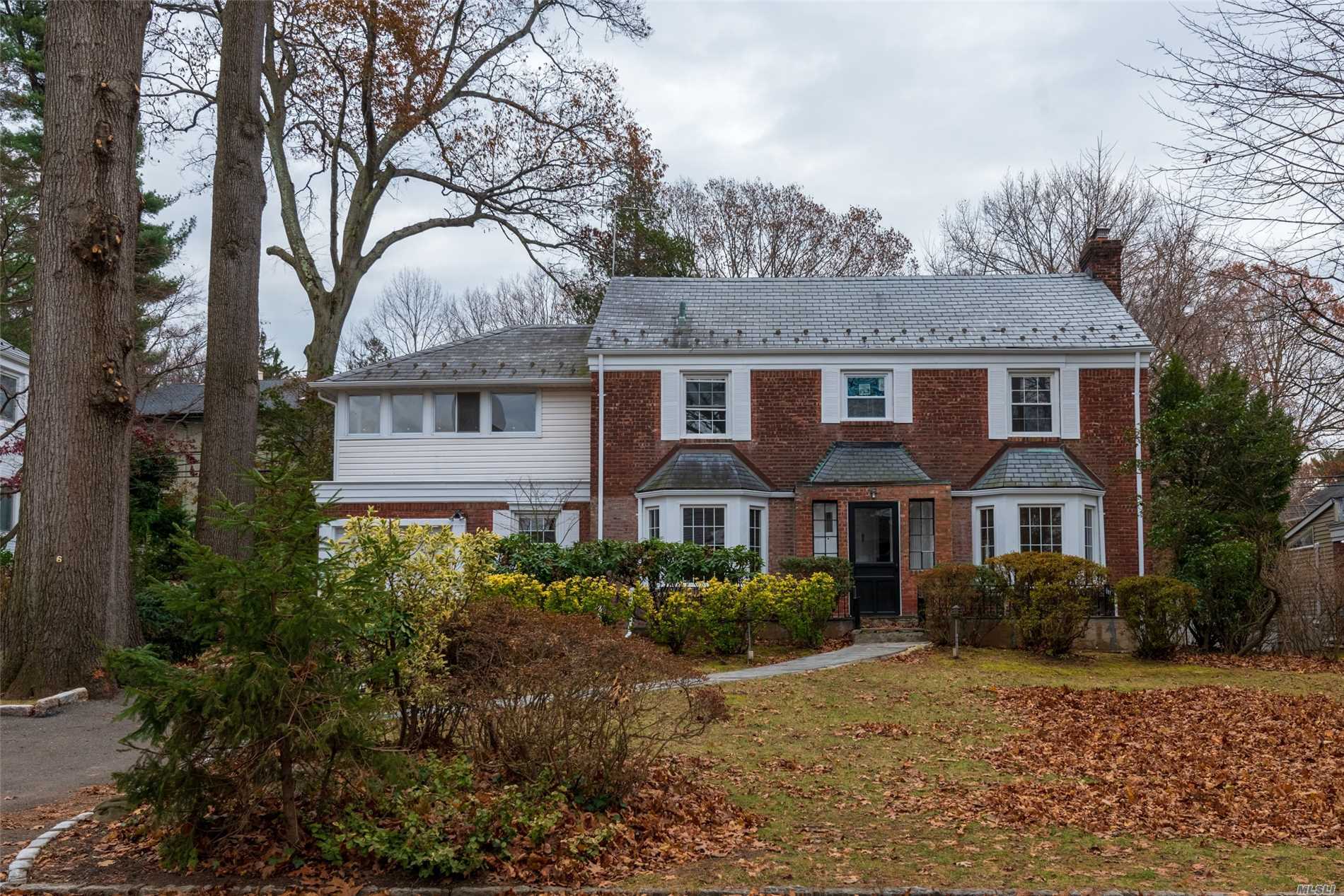 Gorgeous, Bright, Renovated Brick Center Hall Colonial! This Home Features A Lovely Living Room With Fireplace, Bedroom, 1.5 Baths, Den On First Floor. Upstairs You Have 4 Bedrooms, 2 Baths, Plus Attic. A Must See!