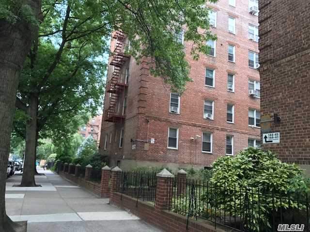 Location, Location, Down Town Of Flushing, Elevator Building , Sunny 1 Bedroom Apartment On 3rd Floor, Nice Layout. Face To Se, Low Maintenance Fee $498 Include Heat & Water .Courtyard With Nice Garden Sitting Area, Convenient To Subway #7, Lirr , Bus Q12 Q26/N20, N20G Right On Comer ,  Step Away To Ps20/Js189/Hs, Income Requirement $45K Up !!! No Dog . After 3Yrs Might Sublet