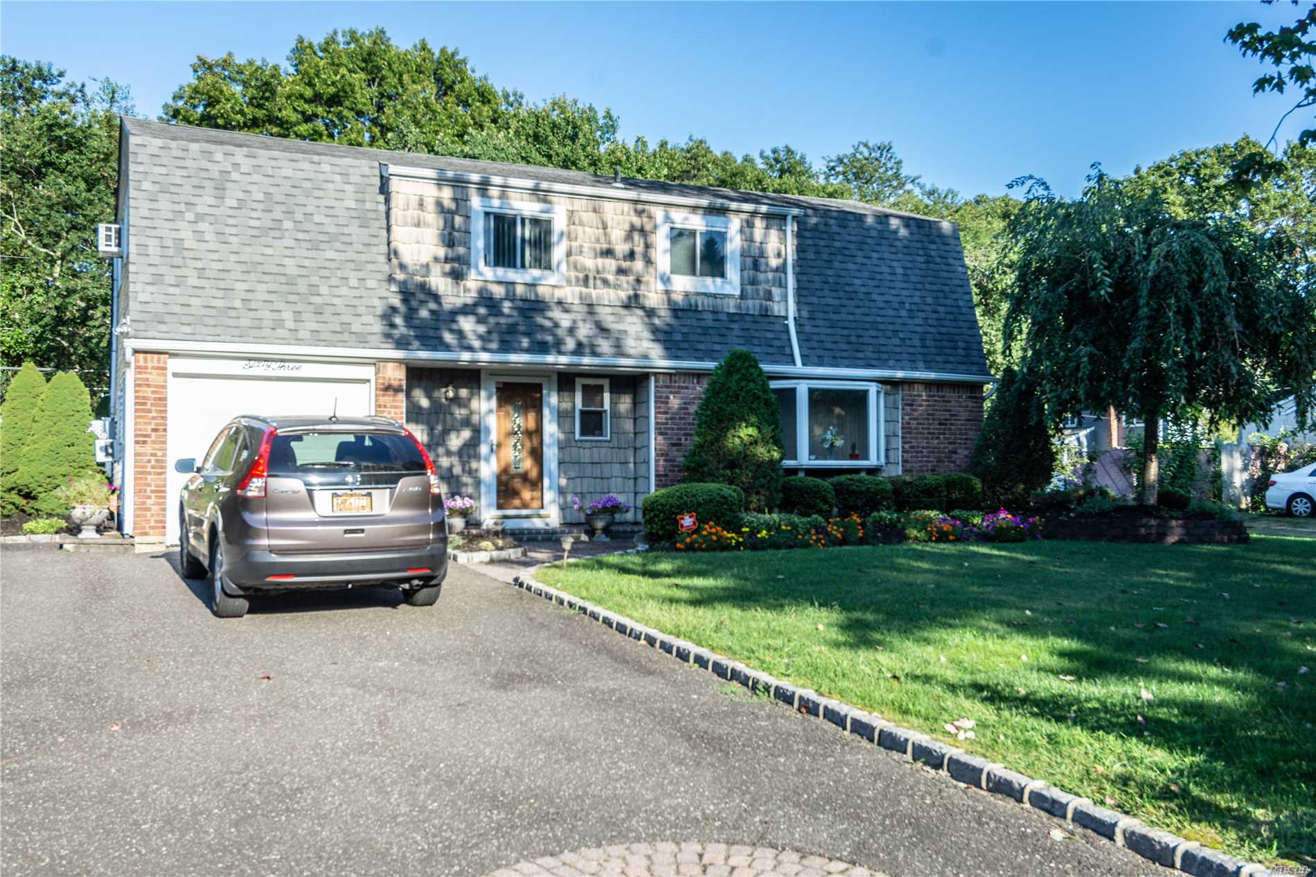 Beautiful 4 Br 1.5 Bath Colonial In Desired Mt Sinai Schools. Features Granite Counter Tops,  Stainless Steel Appliances. Hardwood Floors. Freshly Painted, Crown Moldings. Hi Hat Lighting. New Baths, New Roof, New Heating System, Large Back Yard With Electric Awning, New Fence.