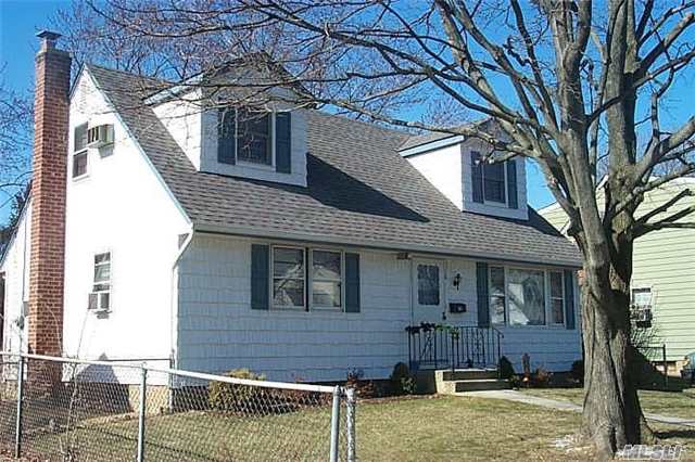 Great Opportunity! Expanded Cape With Full Basement (Half Finished) Full Rear Dormer And 2 Doggy Dormers In Front. Oversized Property (60X120) New Heating System. Updated Kitchen With New Appliances, 2 Updated Baths, Heated Florida Rm. Wood Floors, Gas Cooking,  Just Needs A Little Tlc. Hurry!