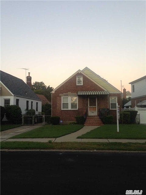 Beautiful Brick One Family House In Prime Fresh Meadows. Near Mass Transit, Schools, Major Highwys, Beautiful Park & Shopping. Hardwood Floors, 2 Bdrm, Large Living Rm, Eat In Kitchen With Wood Cabinets, 1 Full Bath, Finished Basement With Laundry Rm, New Boiler, New Hot Water Tank, New Roof, 1 Car Garage+Pvt Driveway For 2 Cars, Huge Backyard 44X110.