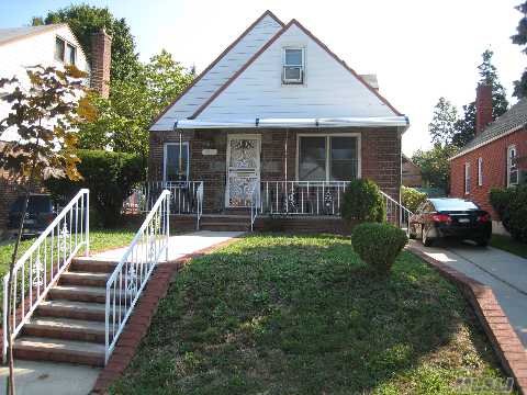 Newly Renovated Large 4 Bedrooms, 2 Baths. New Kitchen, Baths, And Finished Basement. 