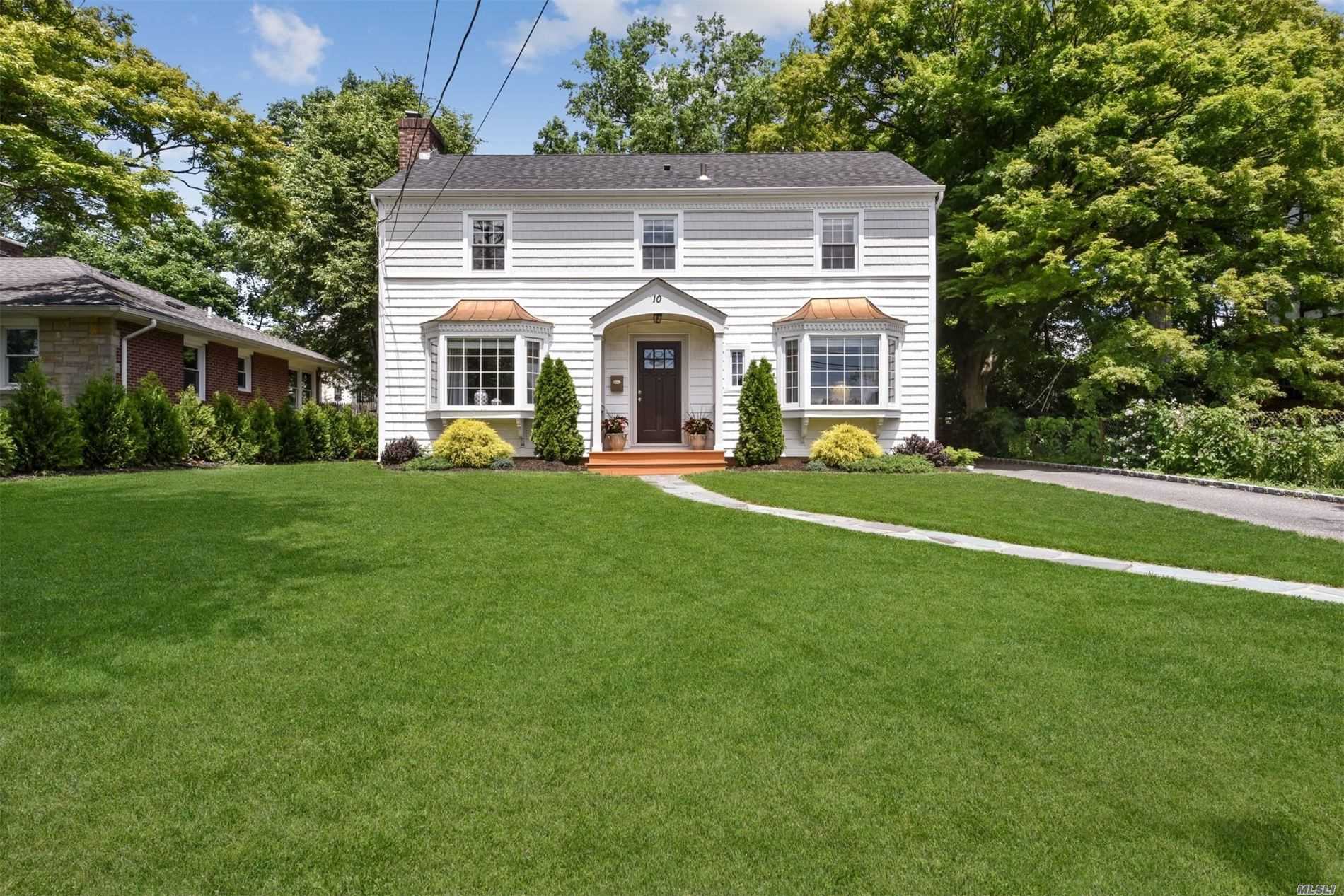 Picture Perfect Beautifully Renovated 3 Br Colonial On Lovely Property. Large Living Room w/ Fpl, New Kitchen, Updated Baths, Lower Level Playroom