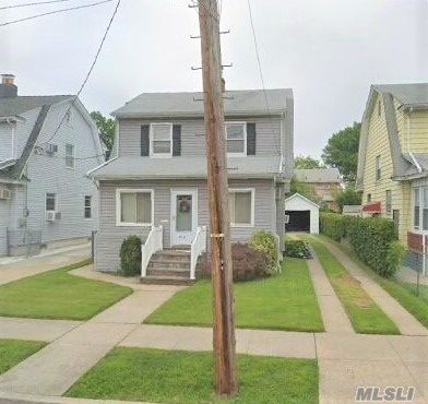 Great Location, Mid-Block, Close To City Buses, Parkways, Schools, Stores, Restaurants, And LIRR. Very Nice Backyard, Very Low Taxes!! Location, Location, Location!!!
