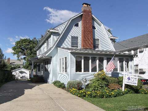 Finely Crafted Center Hall Colonial In Pristine Condition - Thermal Windows, New Roof, Upgraded Elect. And Plumbing, Custom Moldings And Central Vacuum System - Walk To Village And L.I.R.R.  