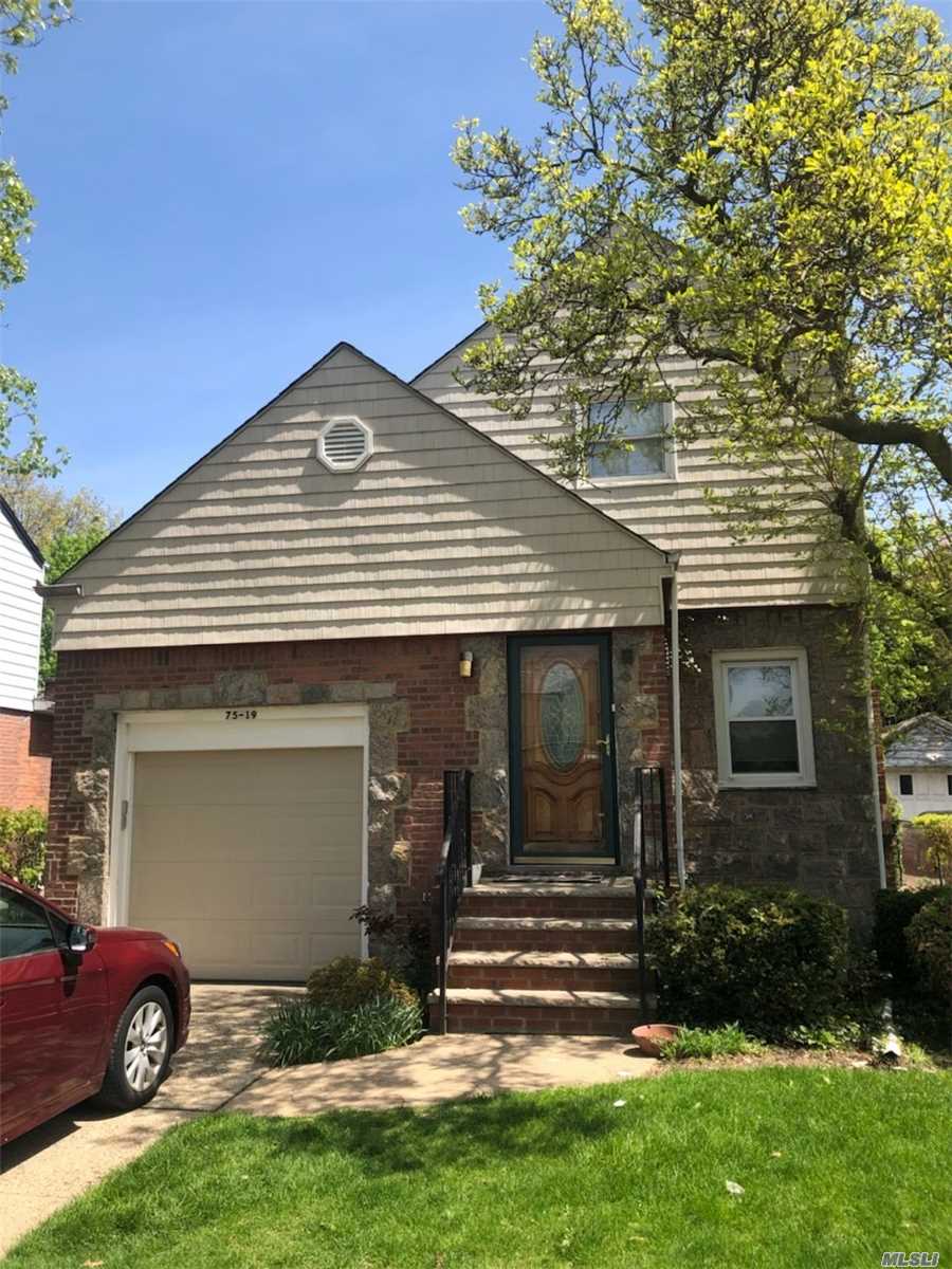 Lovely 3-Bedroom Detached Colonial in Great Condition With Many Extras! Inground Sprinklers; Roof is 7 - 8 Years Old; Siding is 10 Years Old; New Windows on First Floor; Basement Has Been Waterproofed. School District 26; P.S.173; J.H.S.216.