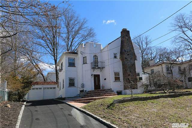 Beautiful Renovated Mediterranean With New Eat-In- Kitchen And Bathrooms. Second Floor Brand New Wood Floors Throughout. This Amazing Home Features A Huge Living Room With Fireplace, Huge Formal Dining Room And Nice Sun Room With Solar Heating. New Brick Patio And Front Landscaping. Sits On A Quiet Street In The Prestigious Village Of Great Neck. A Must See!!!!