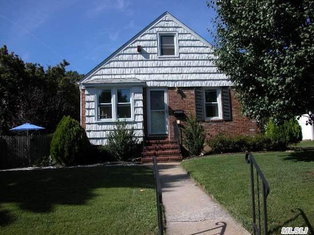 Lovingly Landscaped 3 Bedroom,  1 Bath Cape W/ Room To Expand. Fenced In Yard,  2+ Car Garage,  Eat In Kitchen,  Close To Shops,  Schools,  Lirr,  Beaches,  Golf Course. Prospective Buyer To Verify All Taxes And Info.