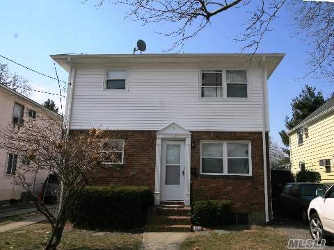 Renovated Two Family - Each Apartment Has 2 Brs 1 Bth. Fully Rented Total Income $2,800. Great Investment Opportunity. 