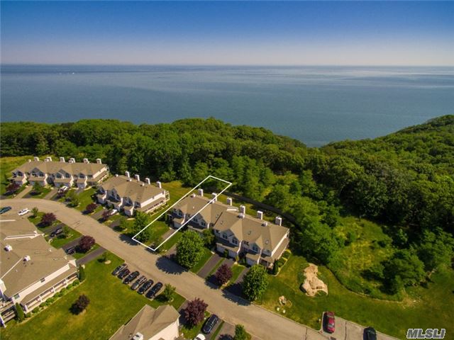 Welcome To The Private Gated Beach Community Of Willow Pond On The Sound. This Corner Unit Townhouse Features Open Floor Plan, Granite Countertops, 2 Fireplaces And Master Suite With Private Deck. Enjoy Resort Style Living With Pool, Tennis And Private Beach All Perched High On The Bluffs Of The Beautiful North Shore.