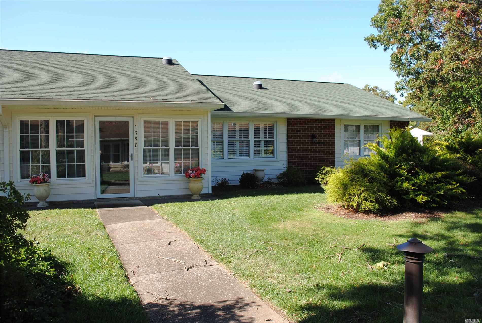 Absolutely stunning Baronet! Totally renovated - new kitchen with breakfast bar and extra cabinets, new bathroom with beautiful walk-in shower, laminate floors throughout, solar tubes, crown molding, custom shaker blinds, windows, all new interior and exterior doors, porch converted to sunroom with year-round use, and beautifully landscaped 3-foot area. Buy now, and you won&rsquo;t have to shovel snow this winter! Subject to terms and conditions of offering plan. Leisure Village has a one-pet policy.