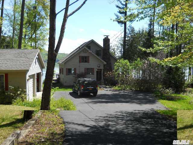 A Beautiful, All Year Round, 4 Bdrm Home On Lovely Lake George! Eik, Formal Dr, Lr With Fplc, Enjoy This Spectacular Sunroom W/ Stunning View Of The Lake. Huge 2 Car Detached Garage - Dock Your Boat In Your Own Covered Boat Slip, Private Beach, Quiet & Tranquil...Newly French Drains.